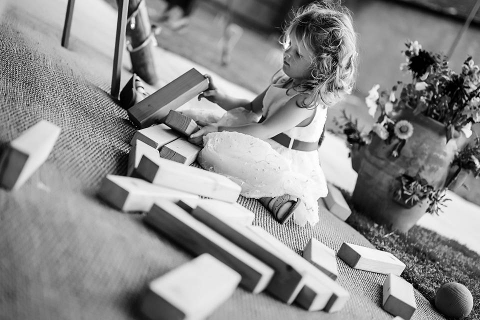 A little girl playing Jenga