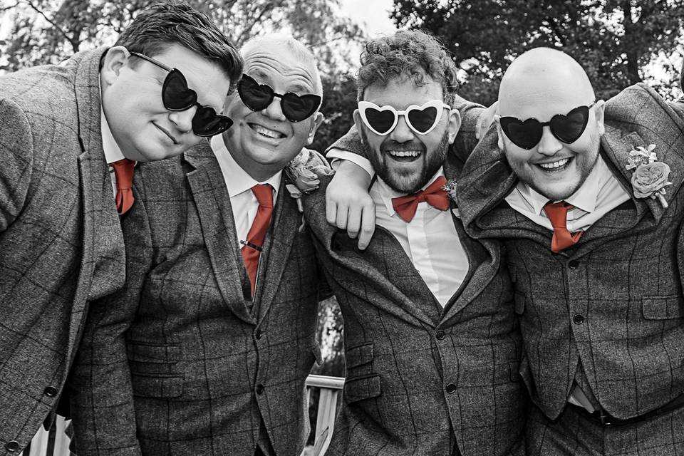 Groomsmen with orange ties
