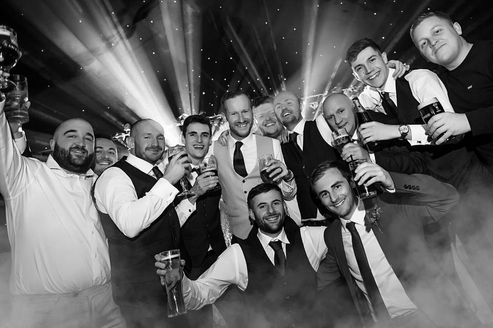 Groomsmen having a team photo