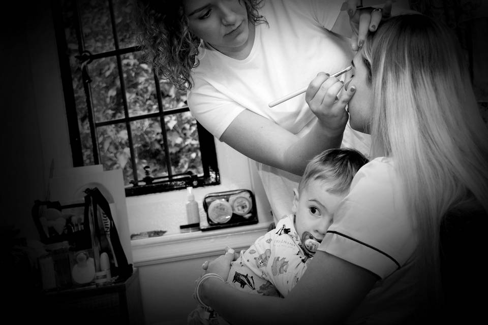 Bride getting her makeup done