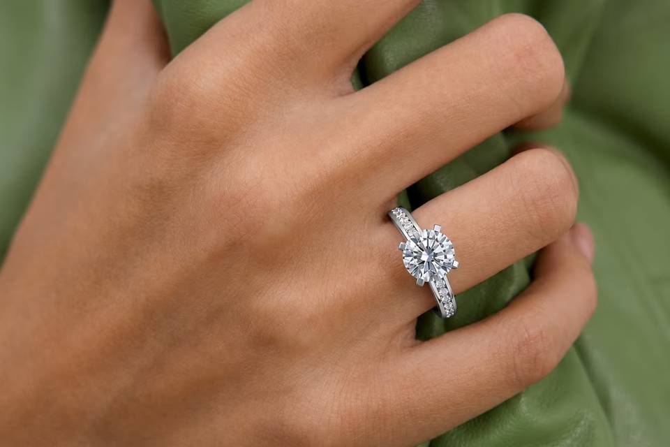 Round Diamond Side Stone Ring