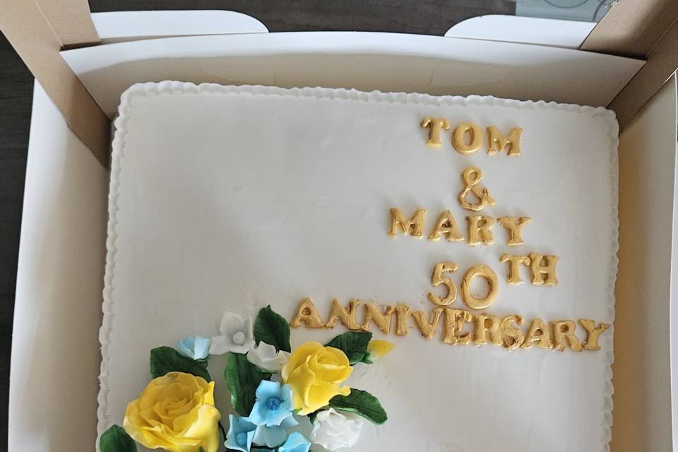 Flower spray anniversary cake