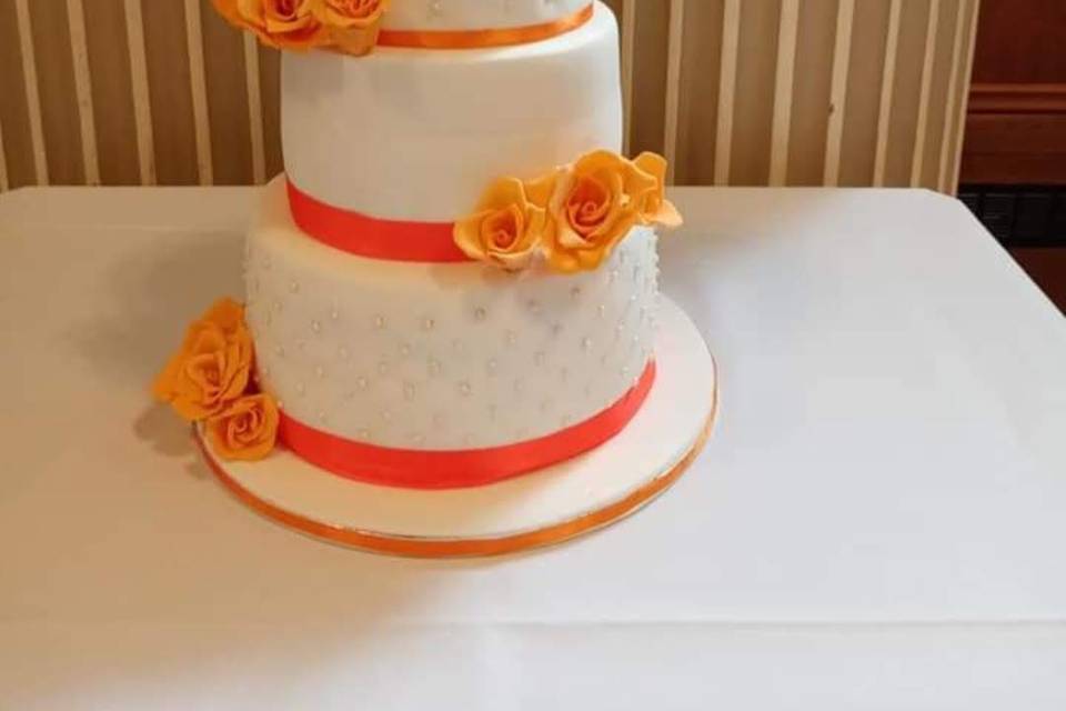 Orange & white theme cake