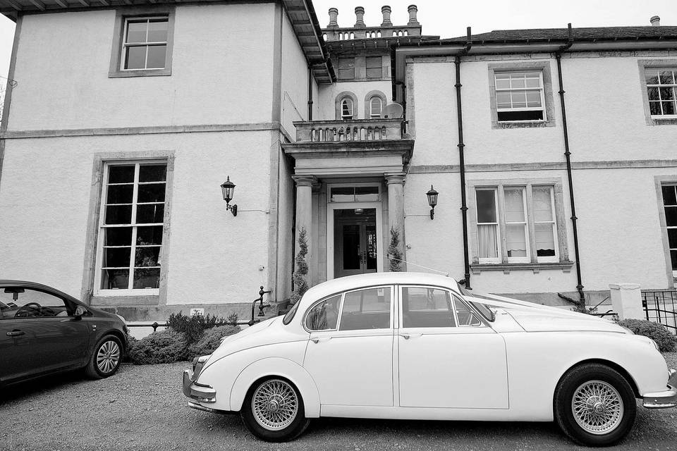 Beautiful car outside the mansion