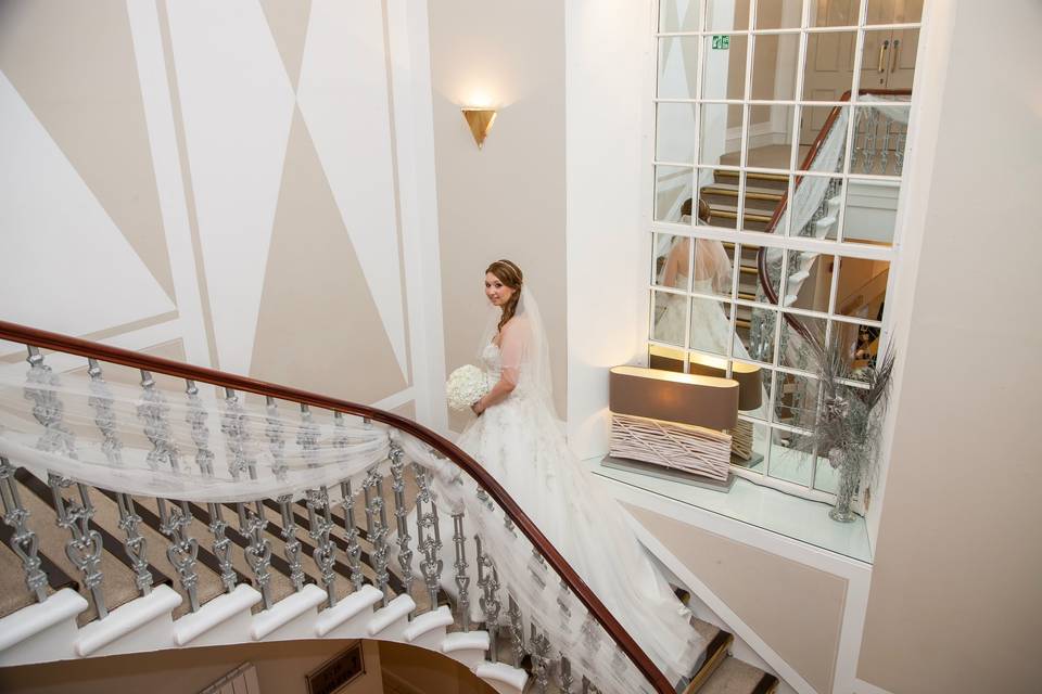 Bride on stairs - reflection