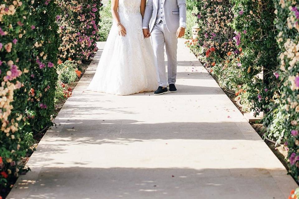 Bride and groom floral arches