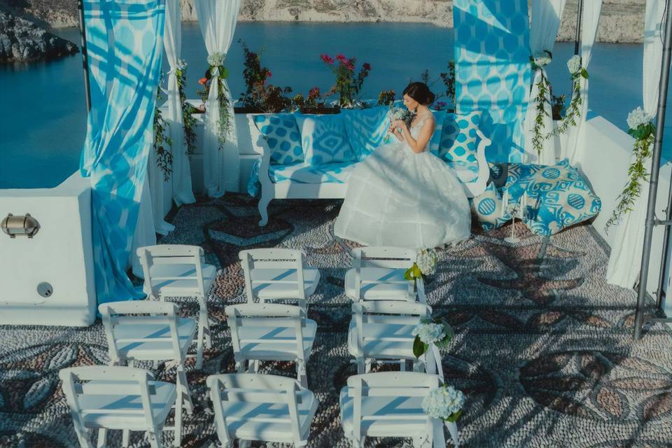 Bride seated on a couch