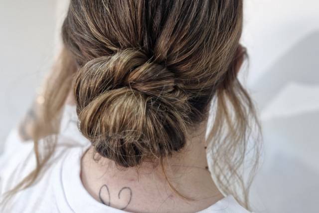 Low bun with slight textured c