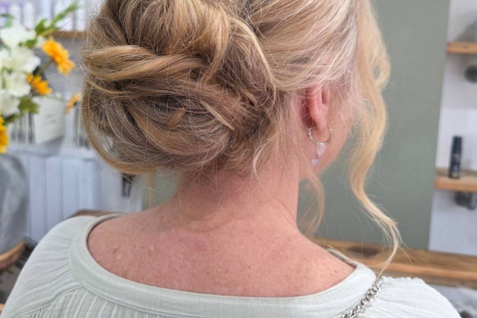 Soft romantic low bun