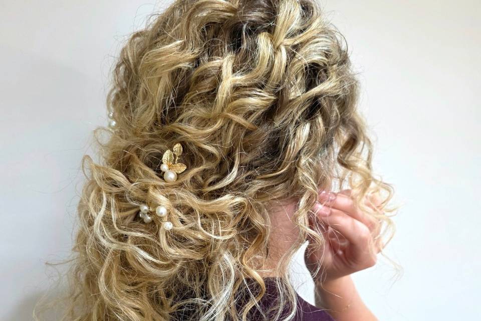 Boho undone bun onnatural curl