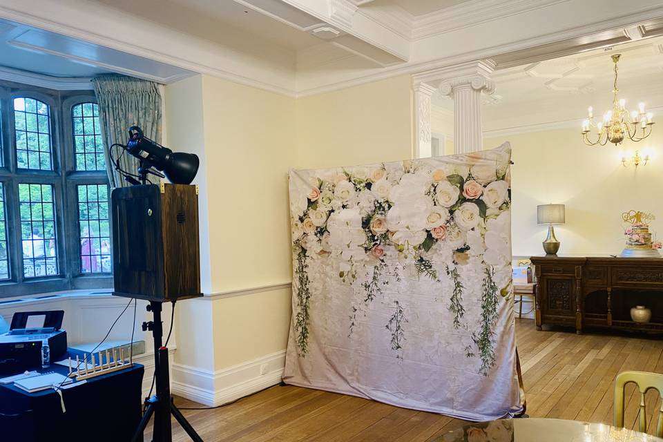 Booth with floral backdrop