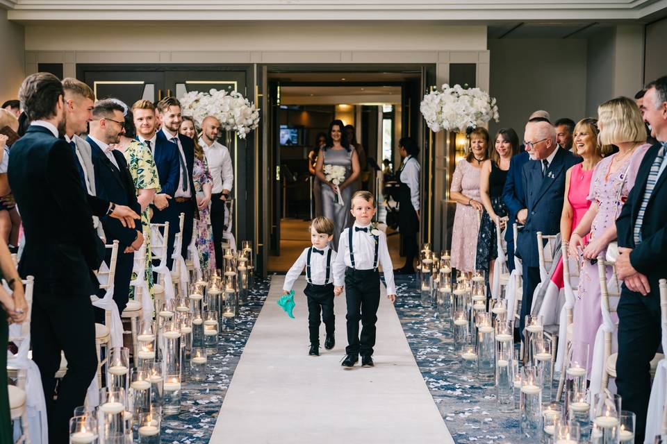 Pageboy walking down the aisle