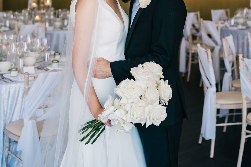 Bride and groom hugging