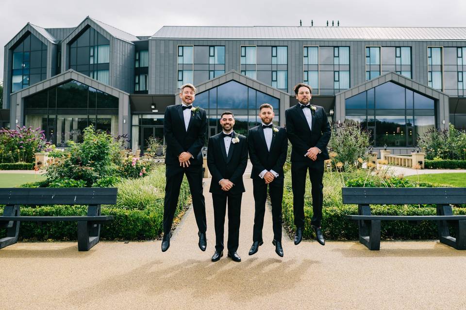 Groomsmen jumping