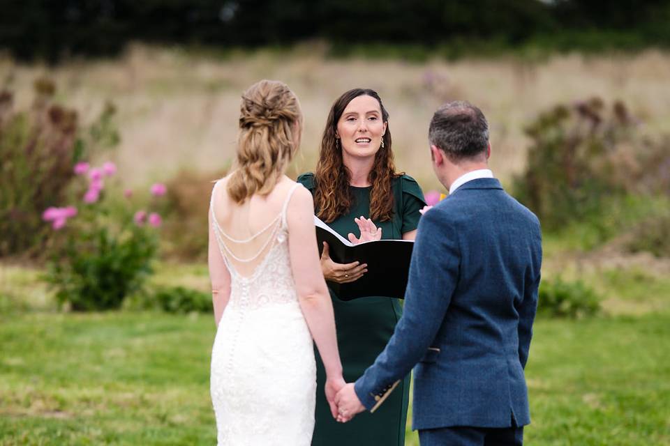 Celebrant between couple