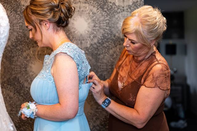 adjusting bridesmaid shoulder strap