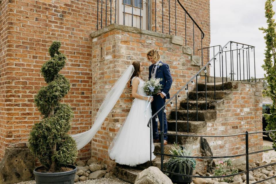 Couple on steps at Clayfield