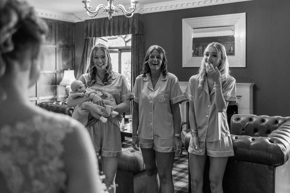 Bridesmaids seeing the bride
