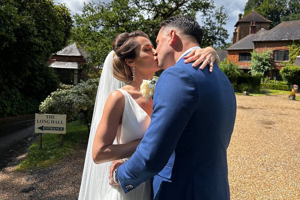 Bride and groom kisses