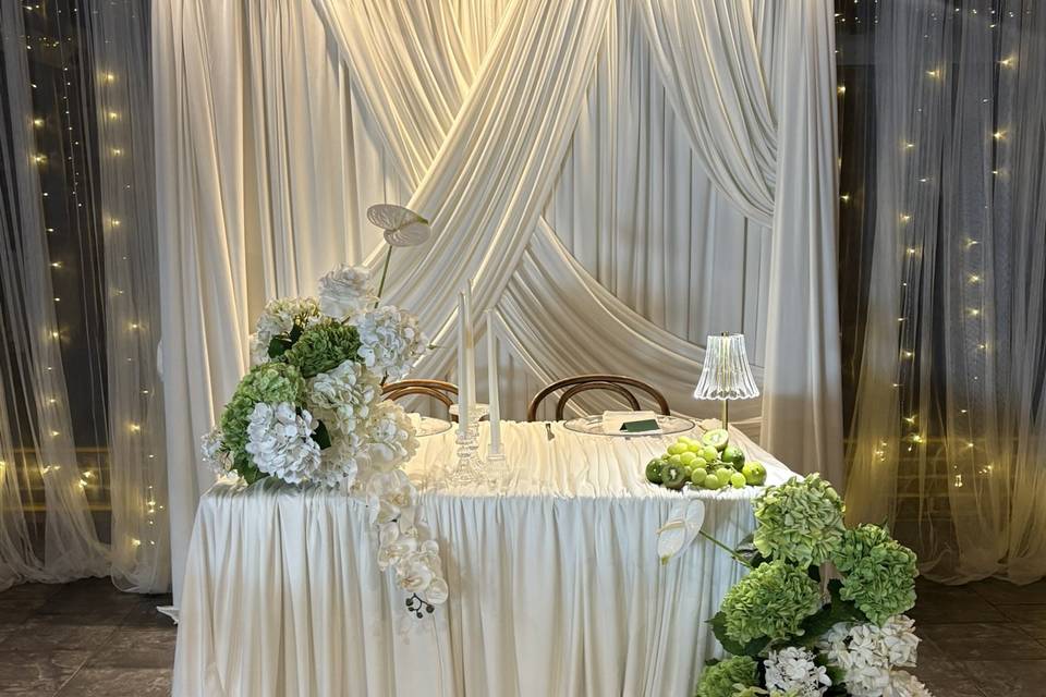 Draped sweetheart table