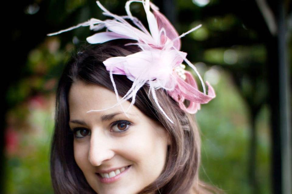 Pink feather fascinator