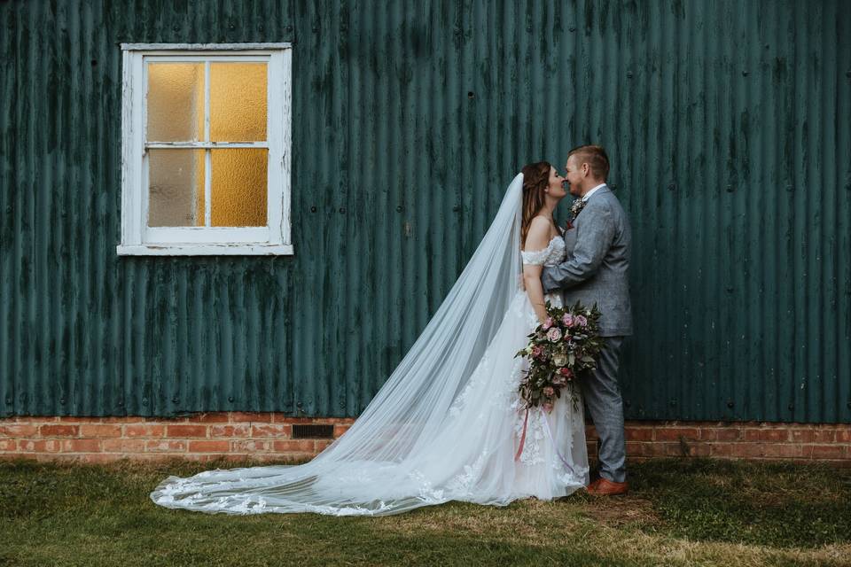 Newlyweds outside Village Hall