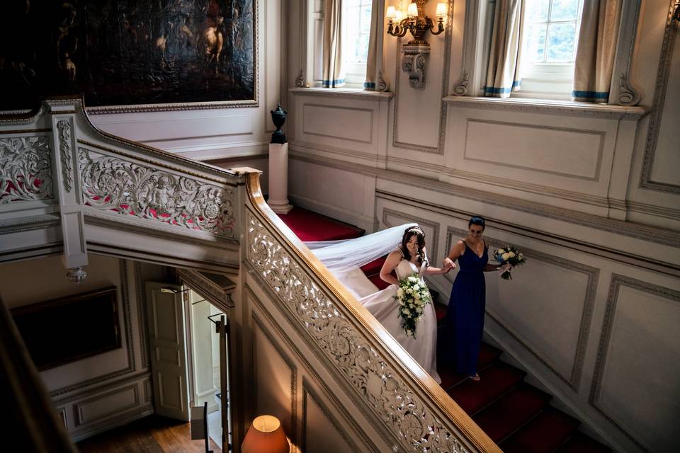 Bride walking down stairs