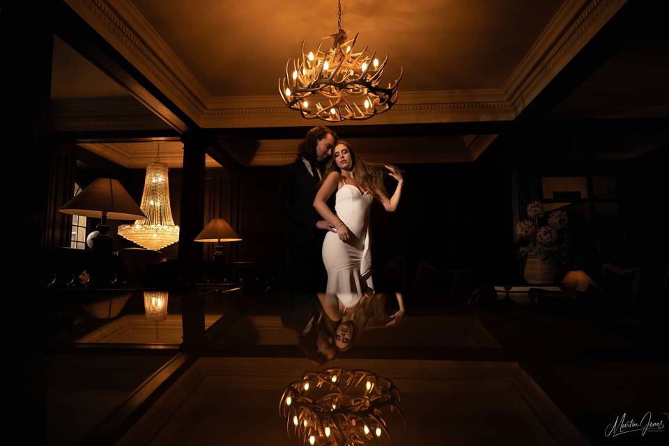 Couple under chandelier