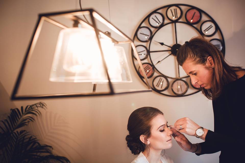 Final touches on the bride