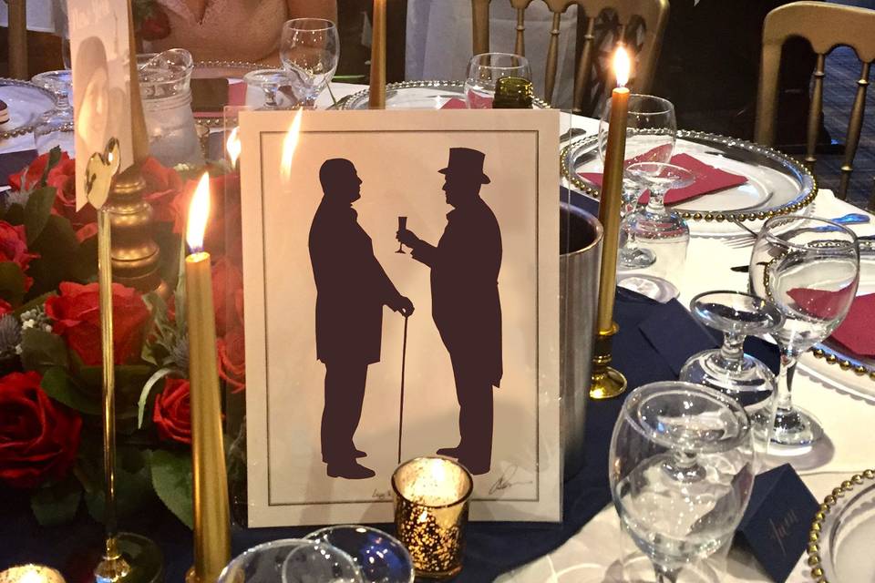 Silhouettes of two grooms