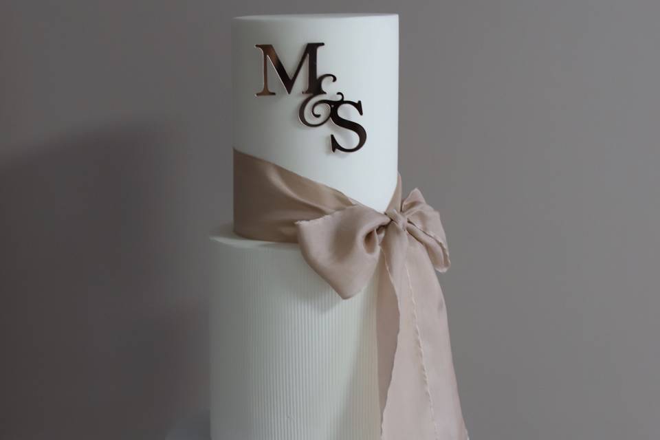 Wedding cake with silk bow