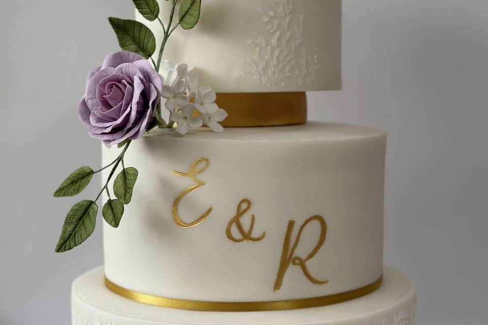 Gold and white wedding cake