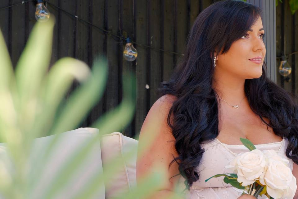 Bride smiling outside