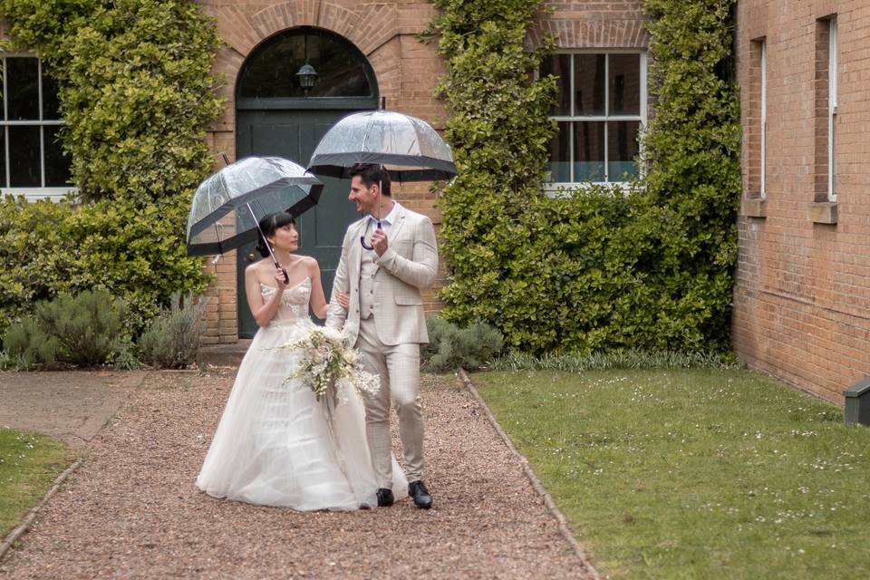 Couple portrait under the rain