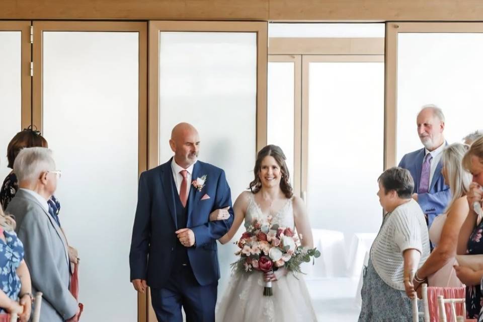 Bride and Father walking down