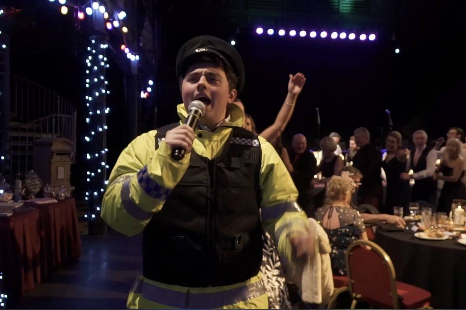 Singing police man