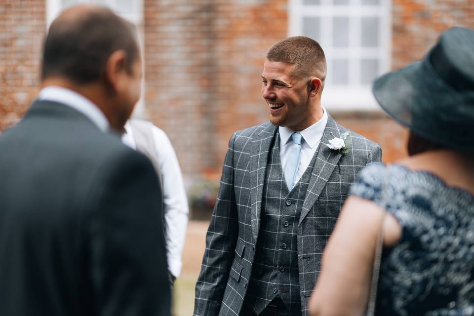 Best man laughing