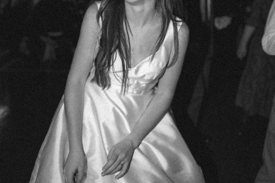 Black and white bride laughing