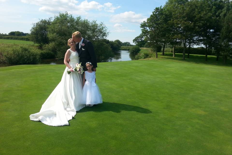 Newlyweds kissing