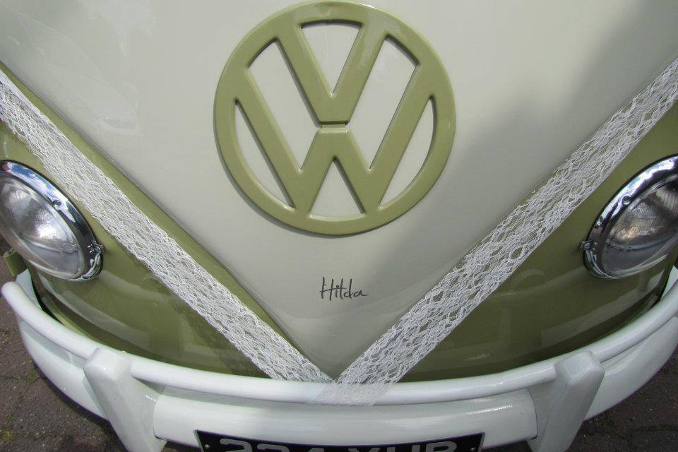 Campervan decorated with wedding lace