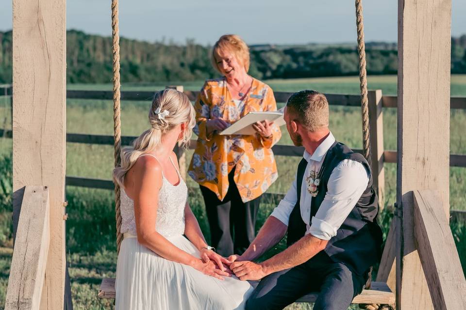 Ceremony on couples swing