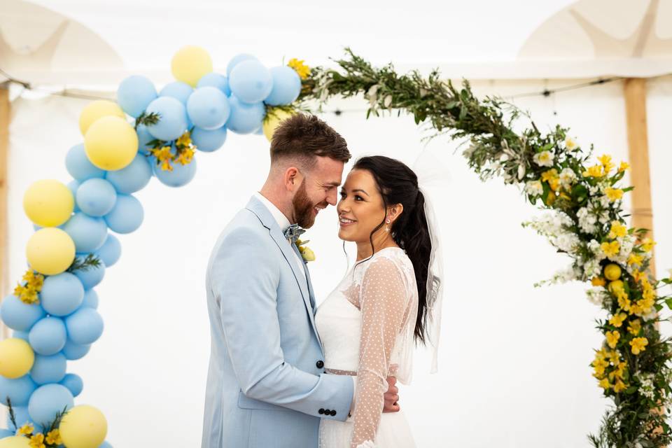 Brdie and Groom inside marquee