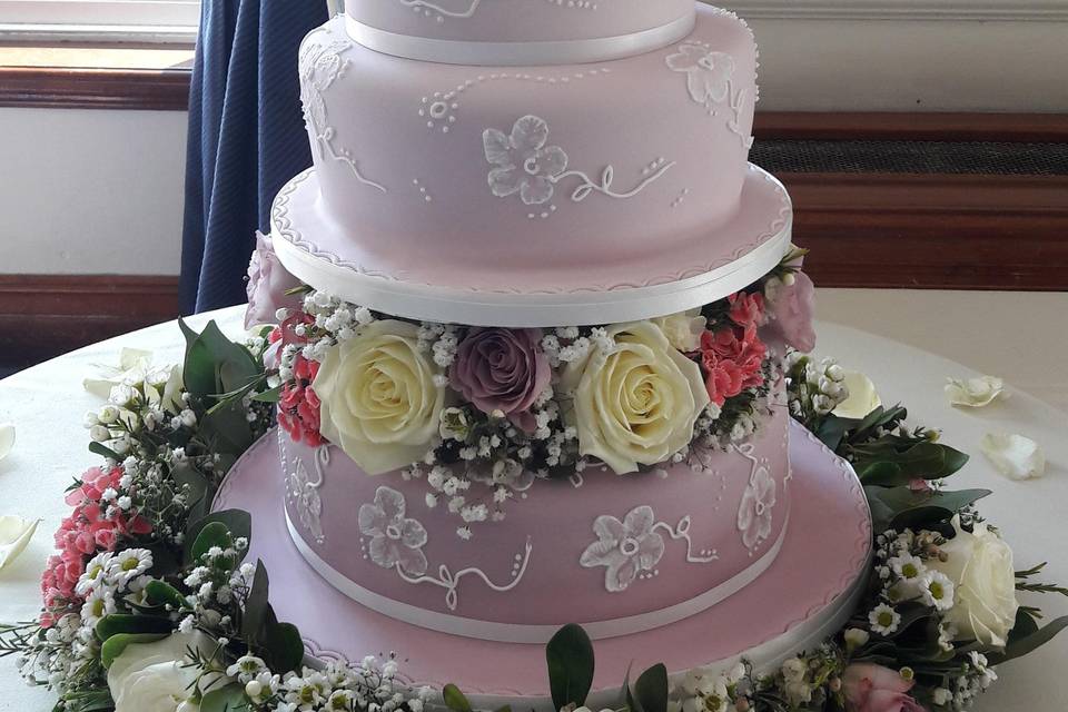 Pink rose cascade wedding cake