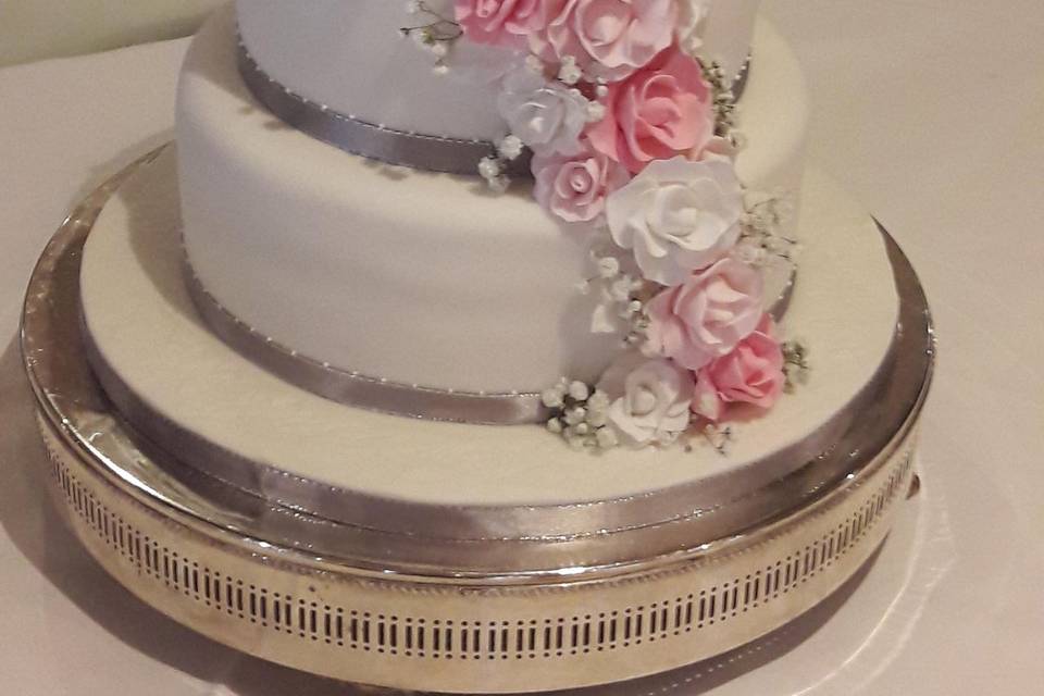 Pink rose cascade wedding cake