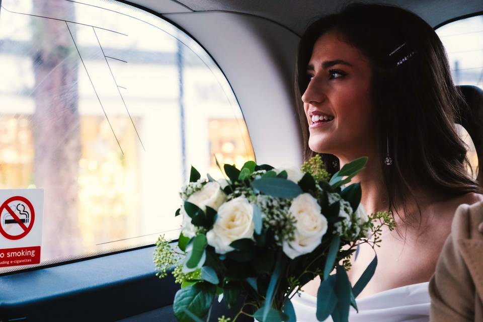 Bride in taxi
