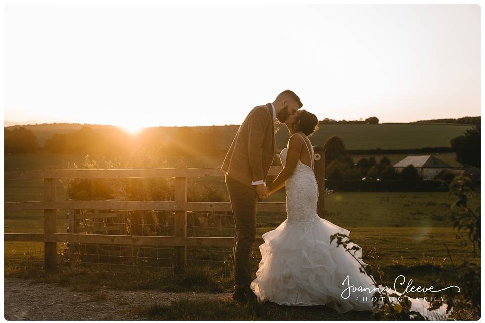 Bride holding a bouquet - Joanna Cleeve