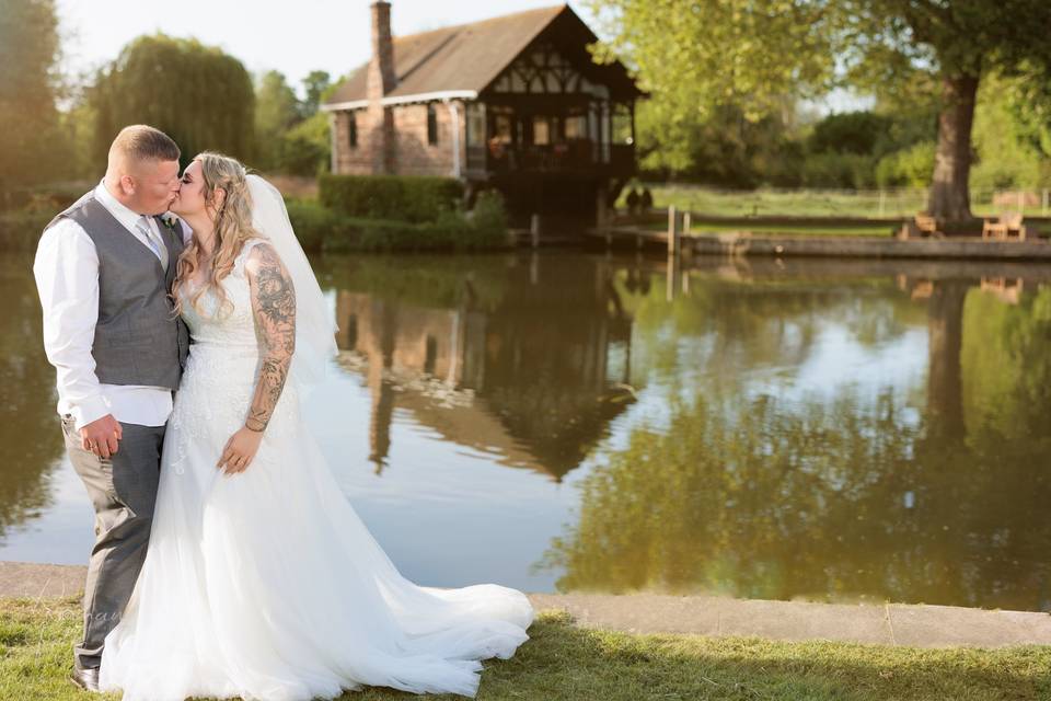 Romantic kiss by the water