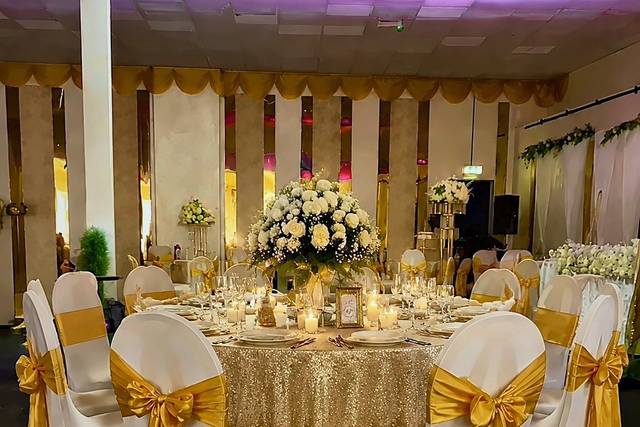 Gold tables and chair sashes