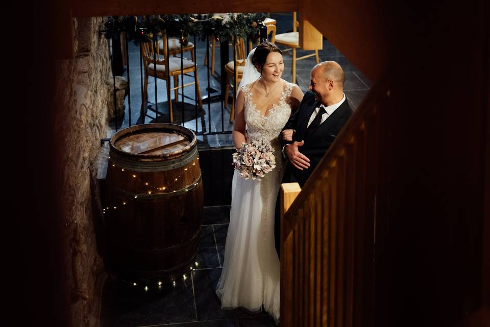 Bride and groom laugh together