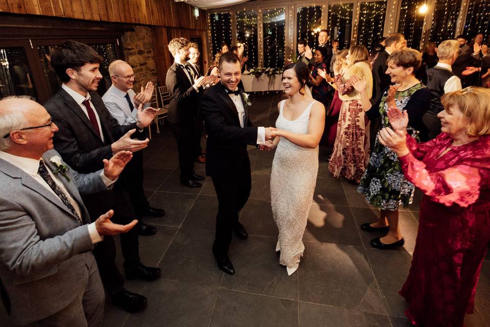 Bride and groom dance together